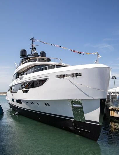 a large white boat aboard TOSUN Yacht for Sale