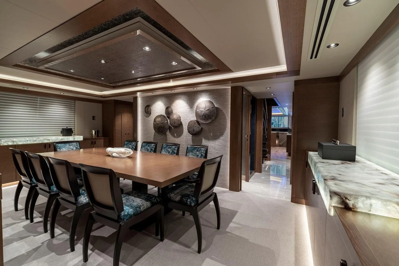 a kitchen with a table and chairs aboard WESTPORT 112 #7766 Yacht for Sale