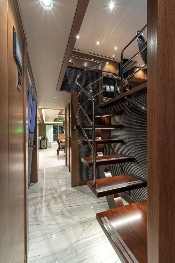 a hallway with a set of stairs aboard WESTPORT 112 #7766 Yacht for Sale
