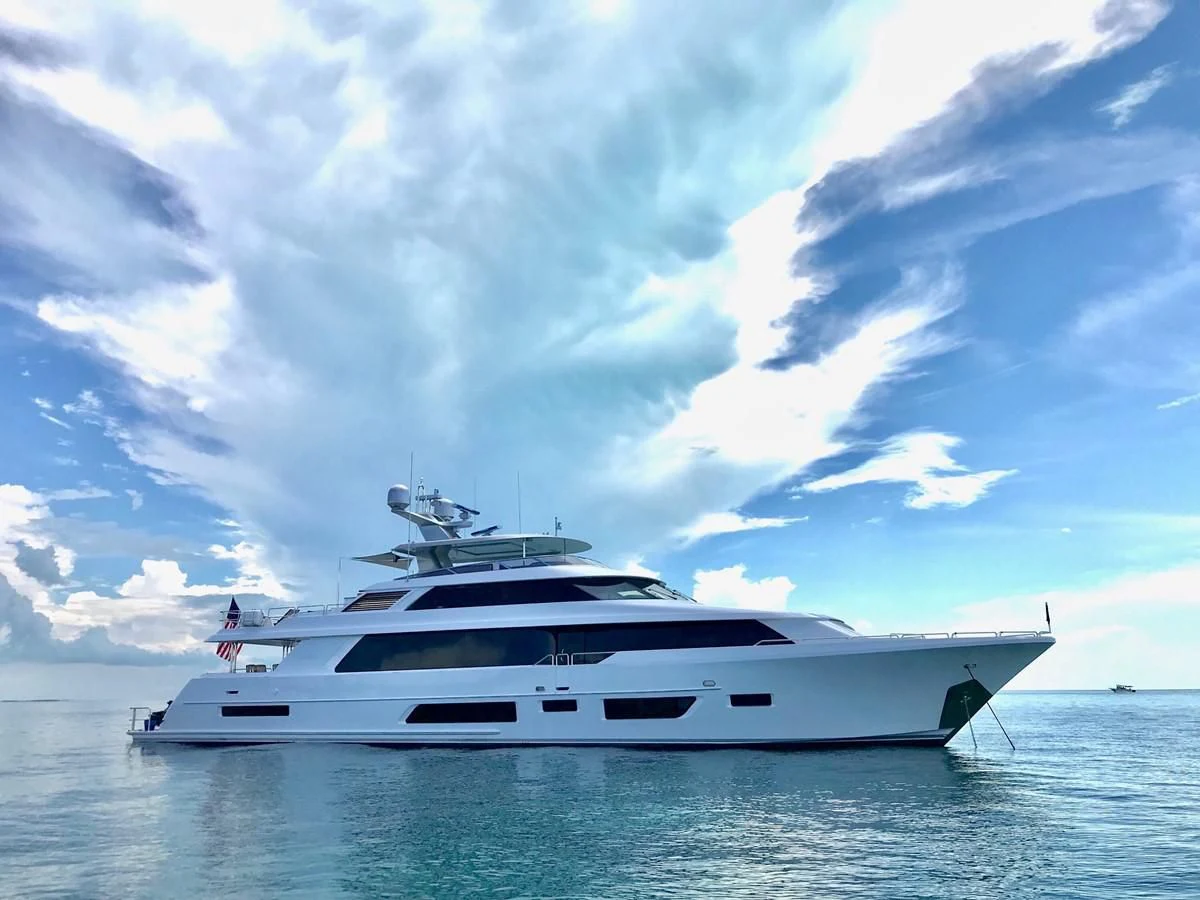 a white yacht in the water aboard WESTPORT 112 #7766 Yacht for Sale