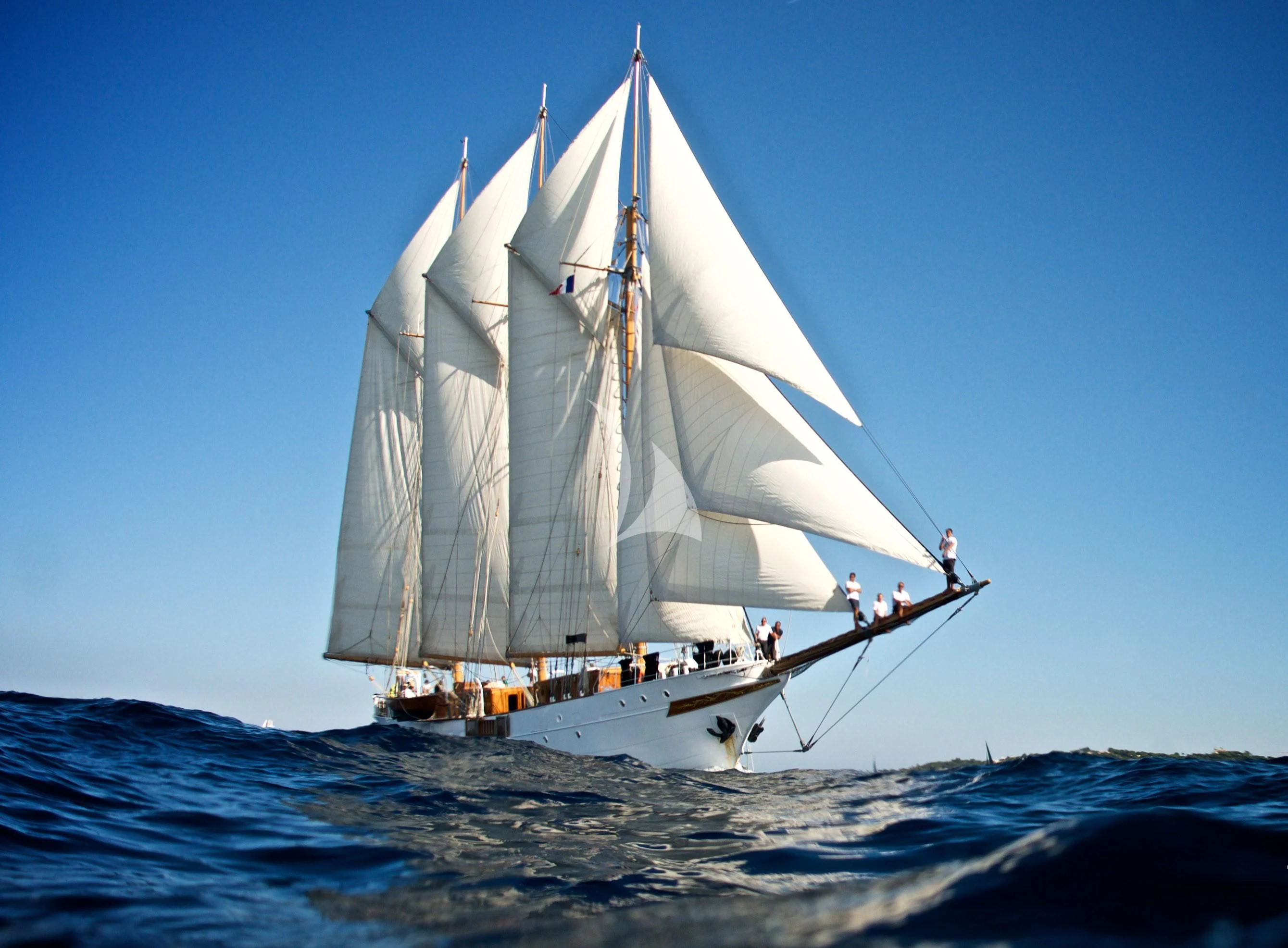 a sailboat on the water aboard TRINAKRIA Yacht for Charter