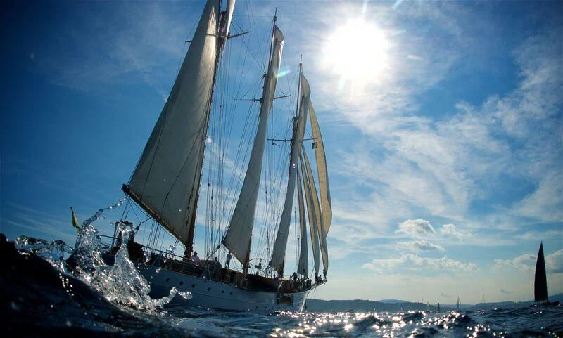 a sailboat on a snowy landscape aboard TRINAKRIA Yacht for Charter