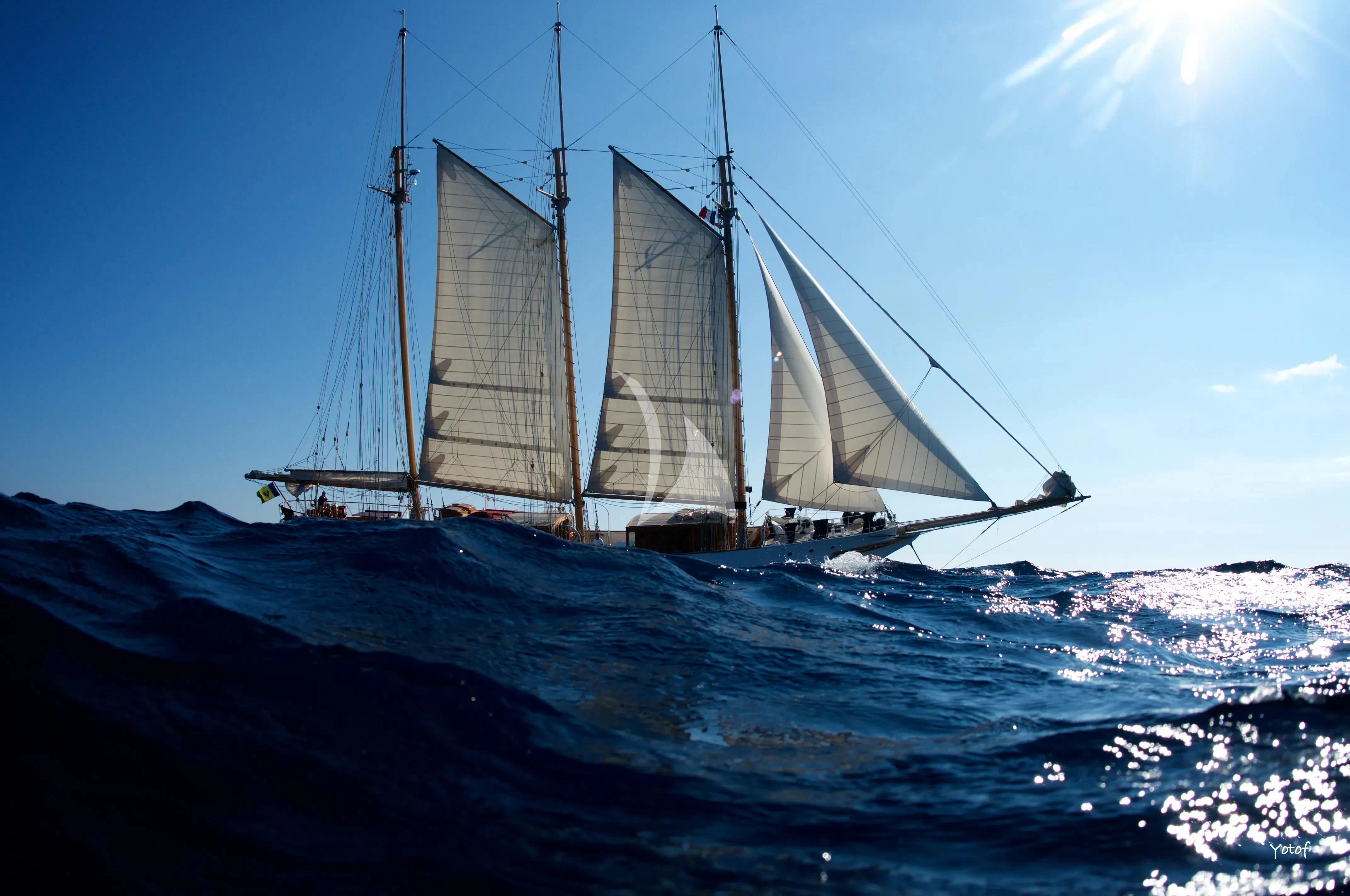 a sailboat on the water aboard TRINAKRIA Yacht for Charter
