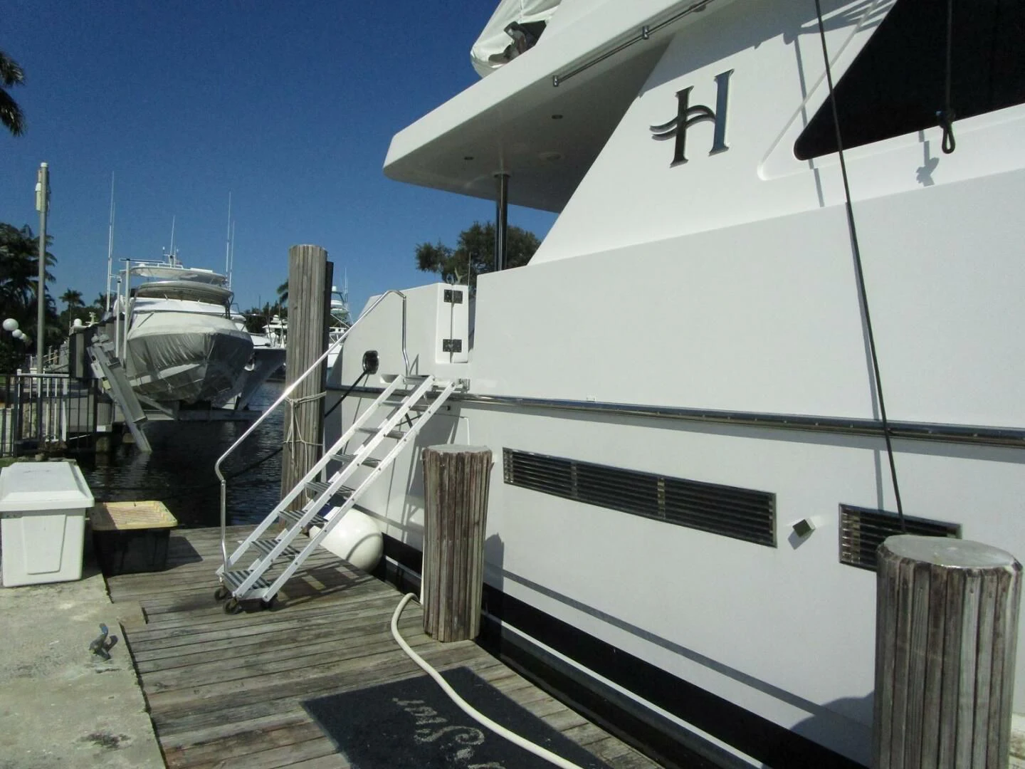 a boat docked at a pier aboard LADY D Yacht for Sale