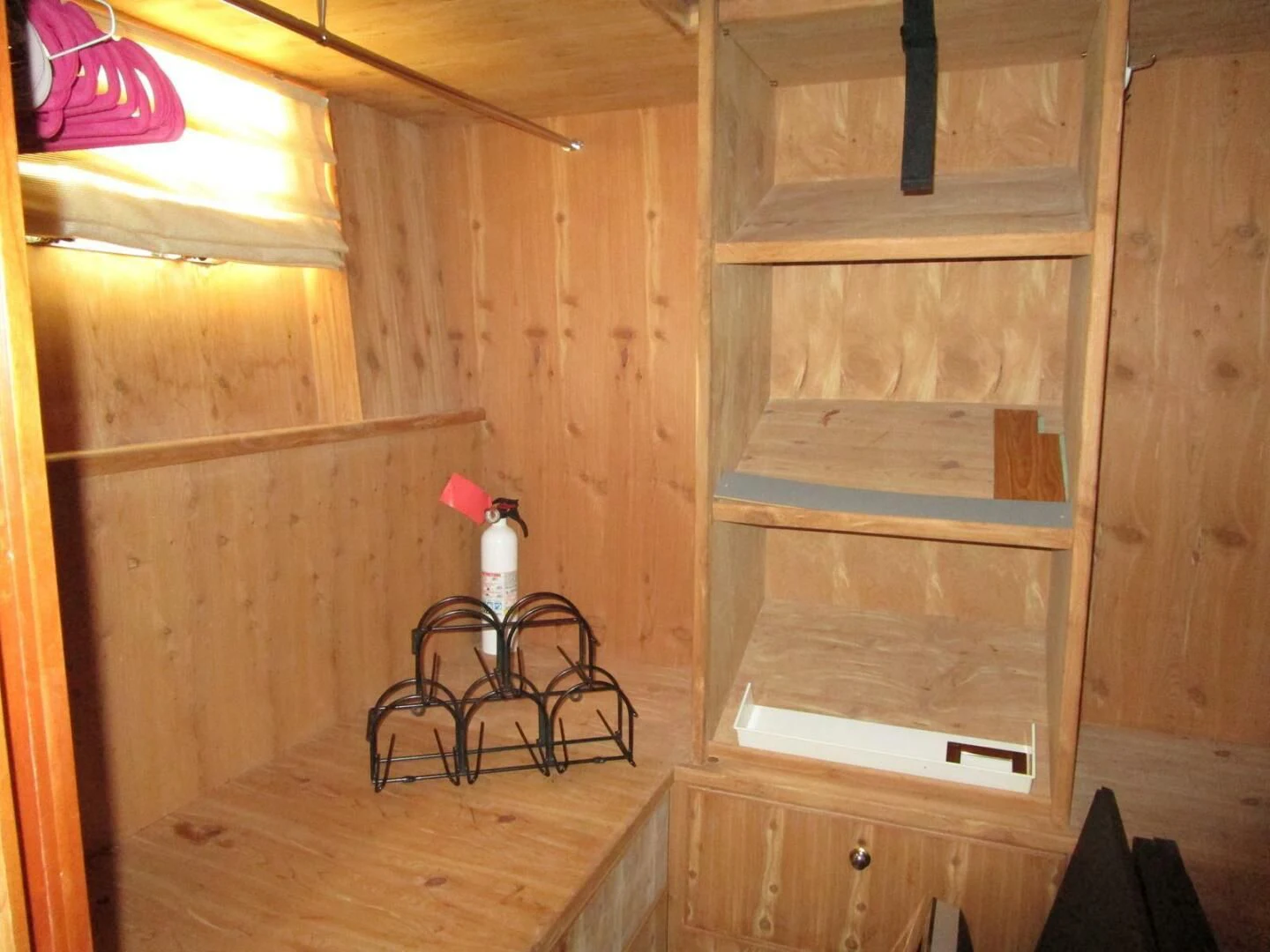 a wooden bunk bed in a wooden room aboard LADY D Yacht for Sale