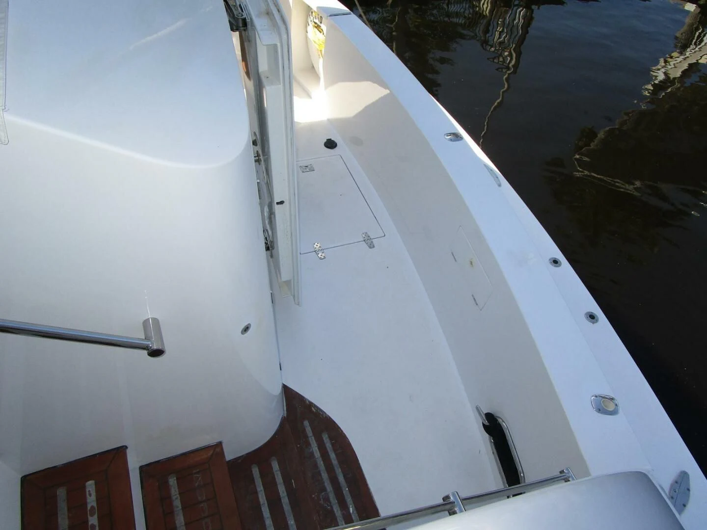 a white building with a red roof aboard LADY D Yacht for Sale