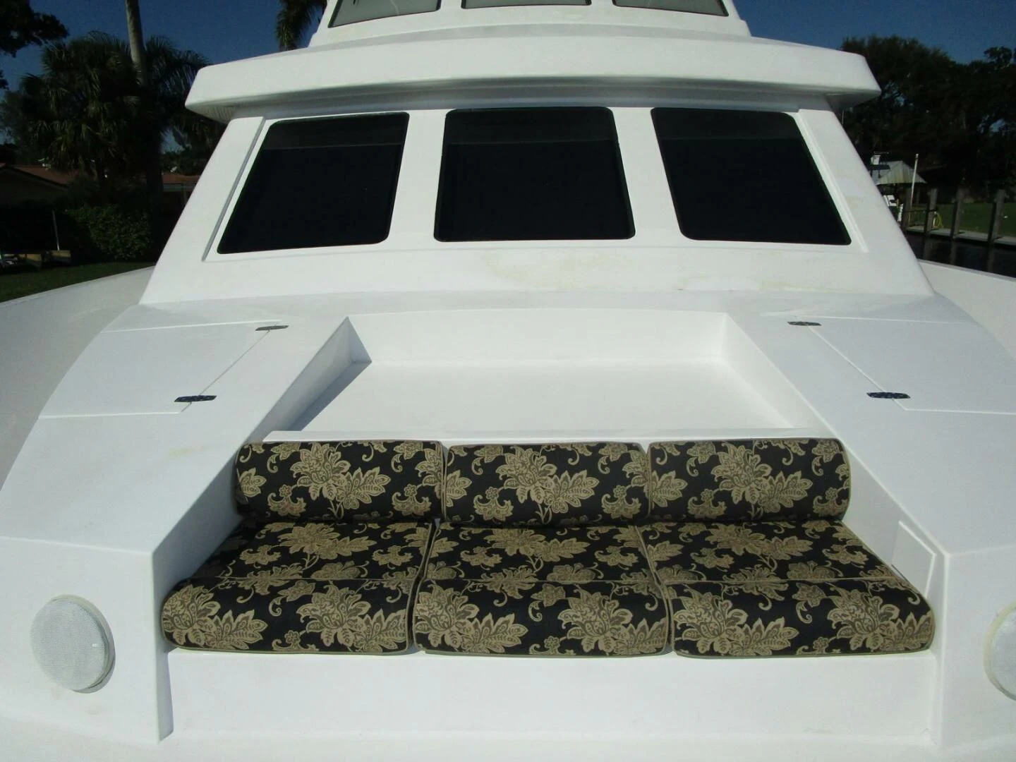 a white car with a hole in the roof aboard LADY D Yacht for Sale