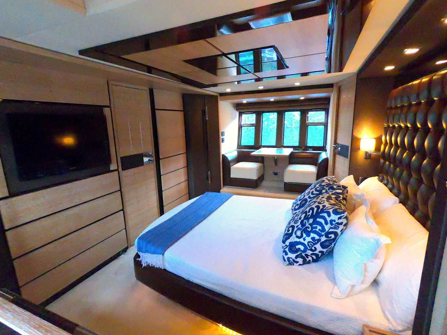 a room with a bed and a television aboard BT 2 Yacht for Sale