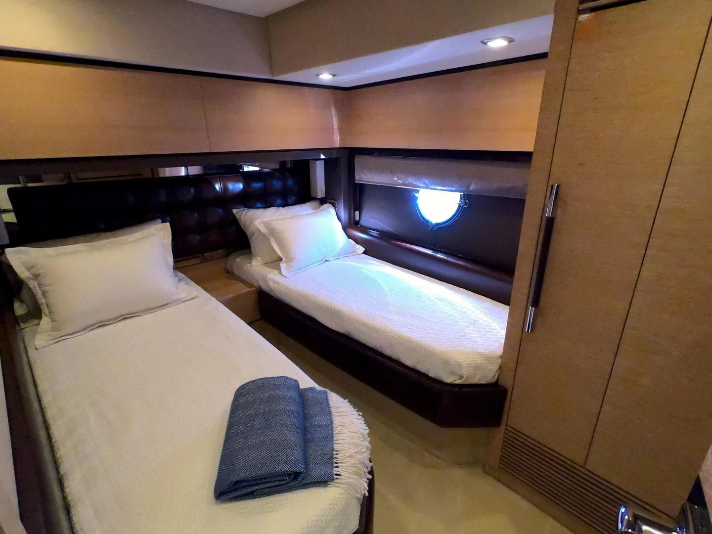 a room with two beds aboard BT 2 Yacht for Sale