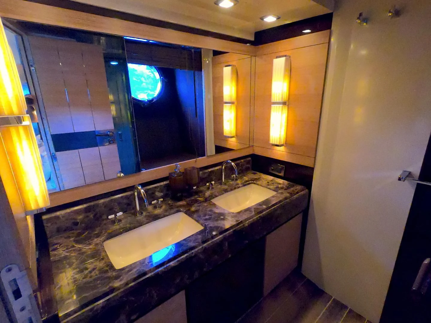 a bathroom with sinks and mirrors aboard BT 2 Yacht for Sale