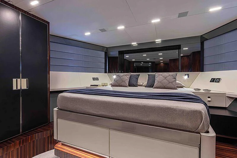 a bed in a room aboard GREY SHARK Yacht for Sale