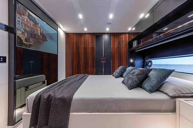 a bed in a room aboard GREY SHARK Yacht for Sale