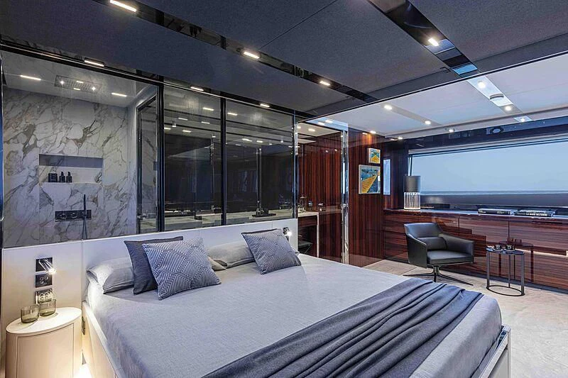 a large bed in a room aboard GREY SHARK Yacht for Sale