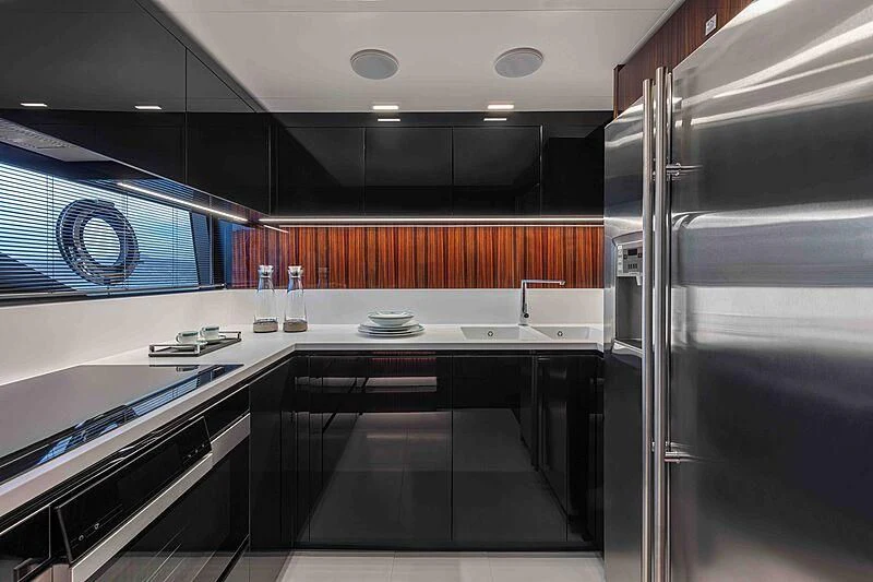 a kitchen with a large counter aboard GREY SHARK Yacht for Sale