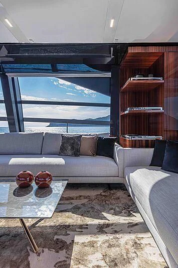 a living room with a large window aboard GREY SHARK Yacht for Sale