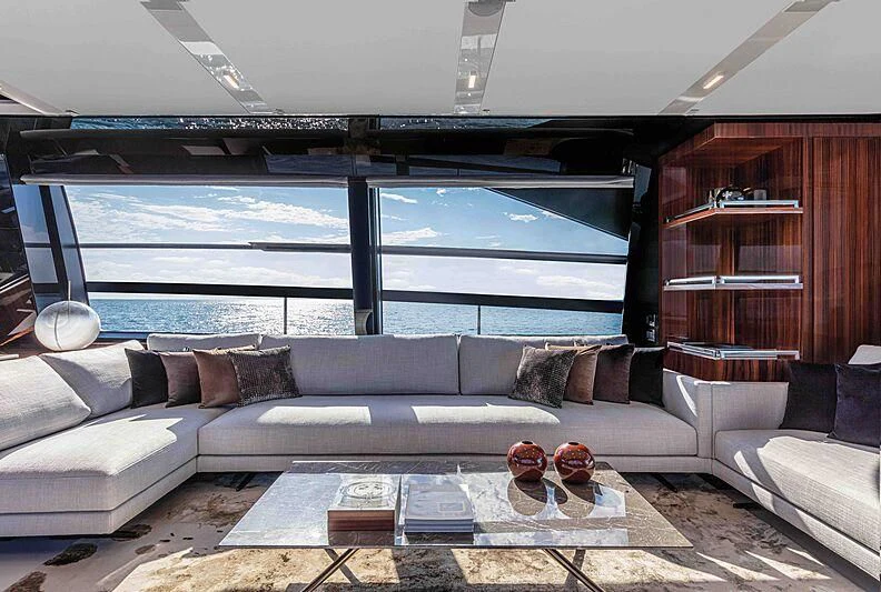 a living room with a large window aboard GREY SHARK Yacht for Sale