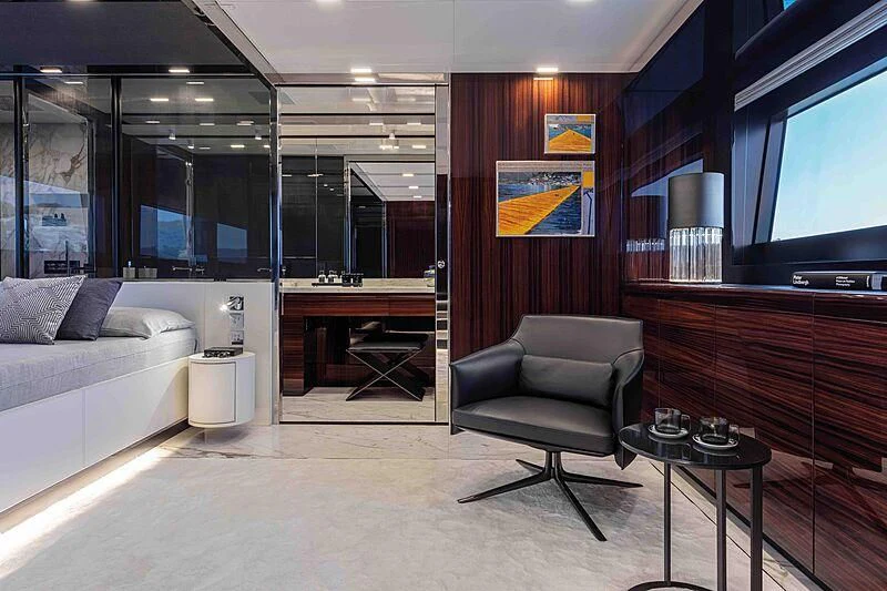 a living room with a couch and a table aboard GREY SHARK Yacht for Sale