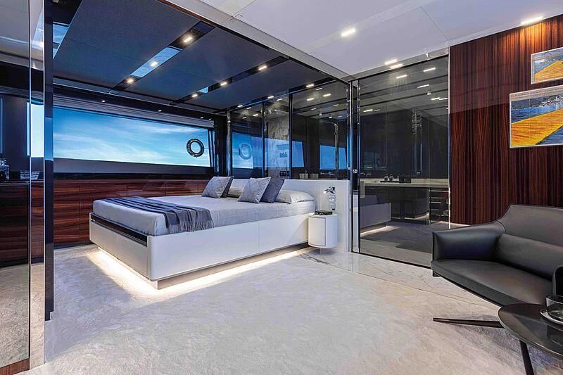 a room with a couch and a tv aboard GREY SHARK Yacht for Sale