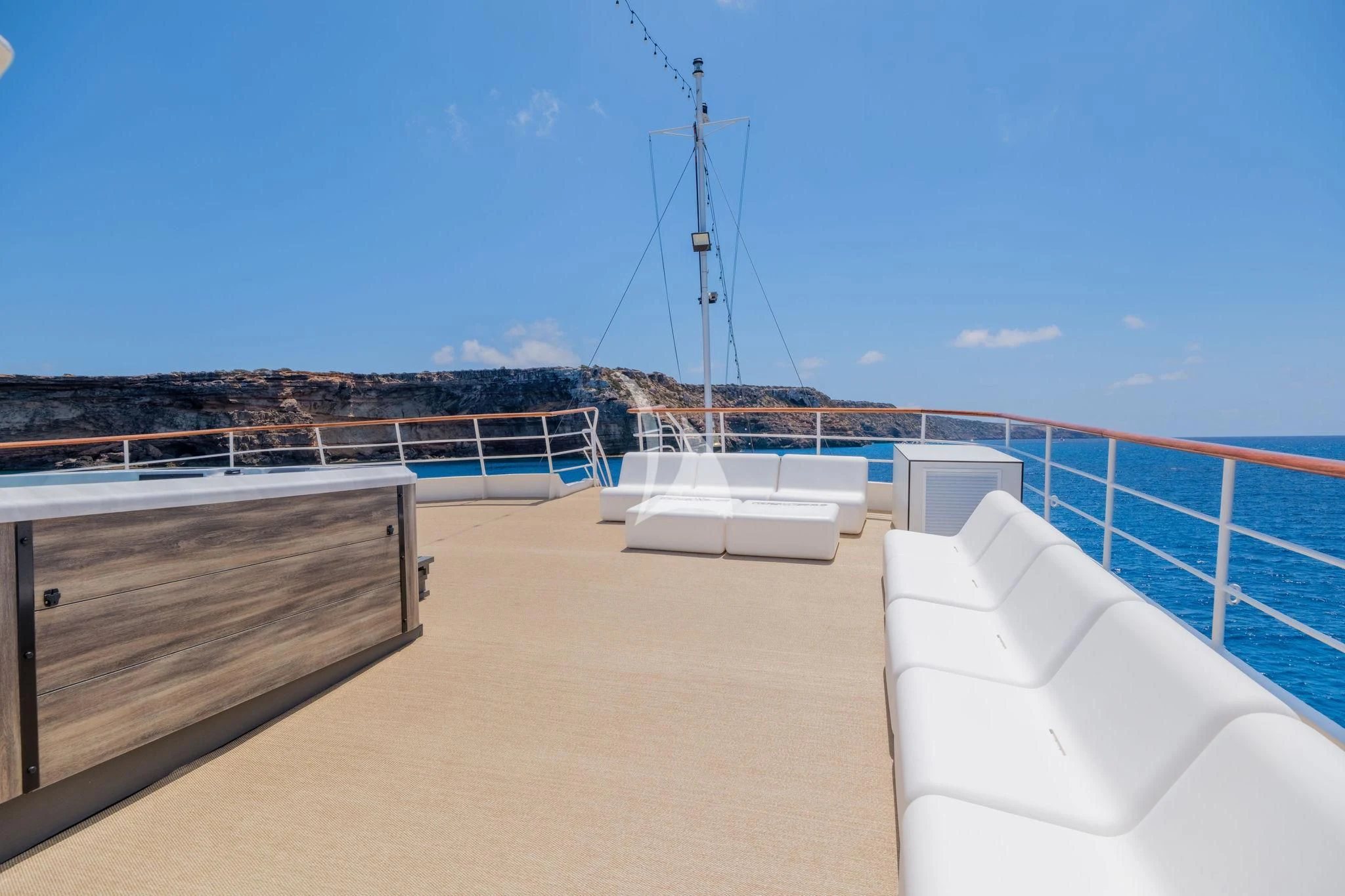 a boat on a dock aboard HARMONY II Yacht for Sale