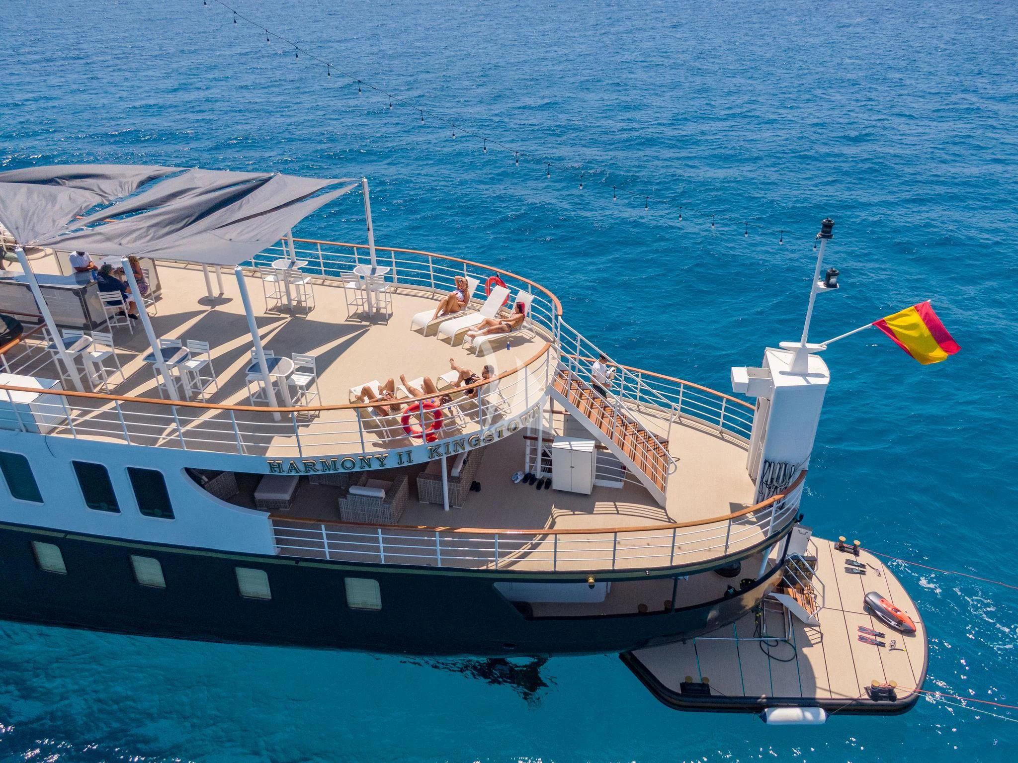 a large boat in the water aboard HARMONY II Yacht for Sale