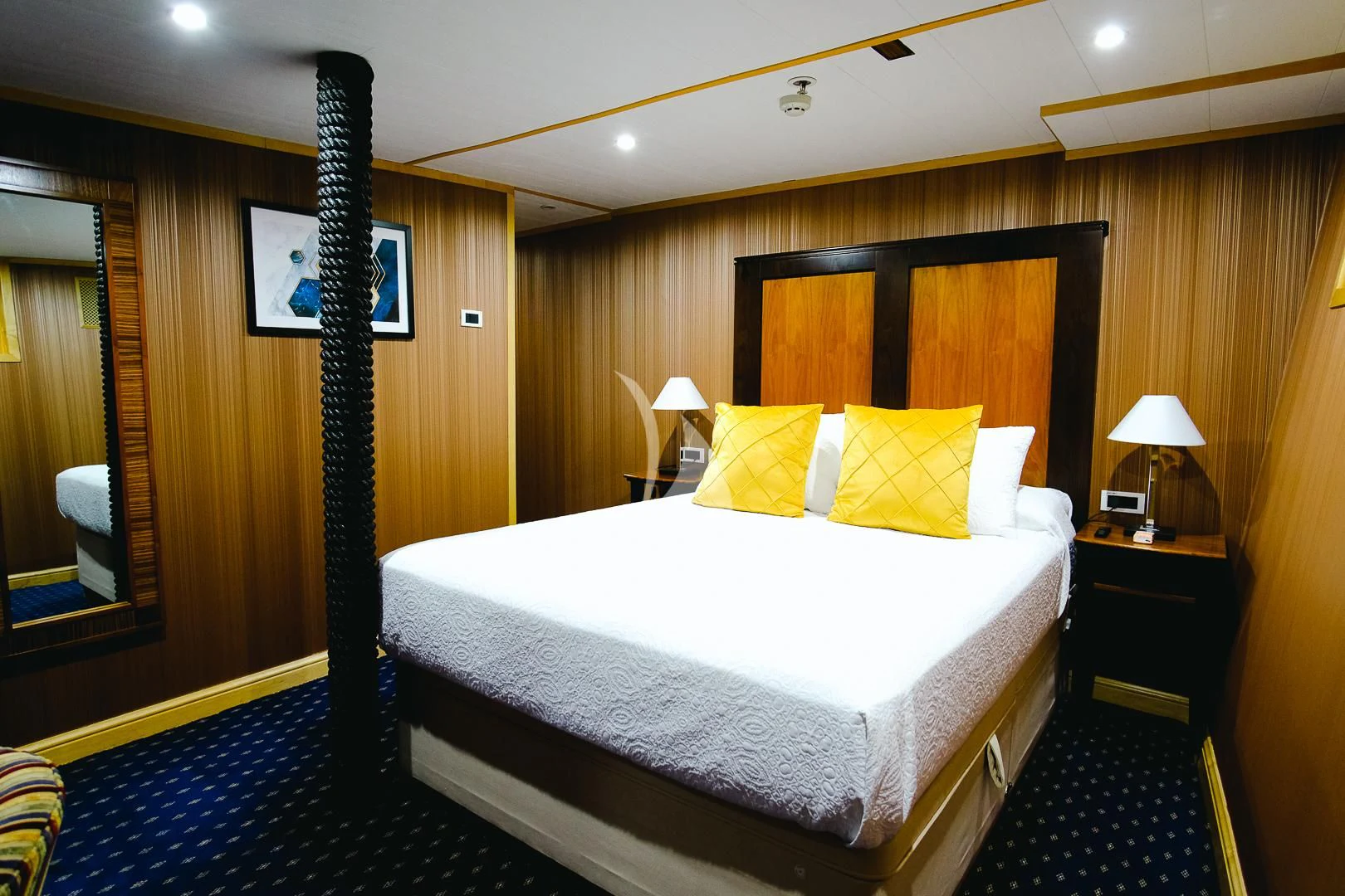 a bed in a hotel room aboard HARMONY II Yacht for Sale