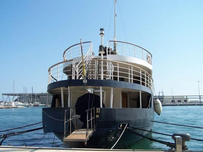 a large boat on the water aboard HARMONY II Yacht for Sale