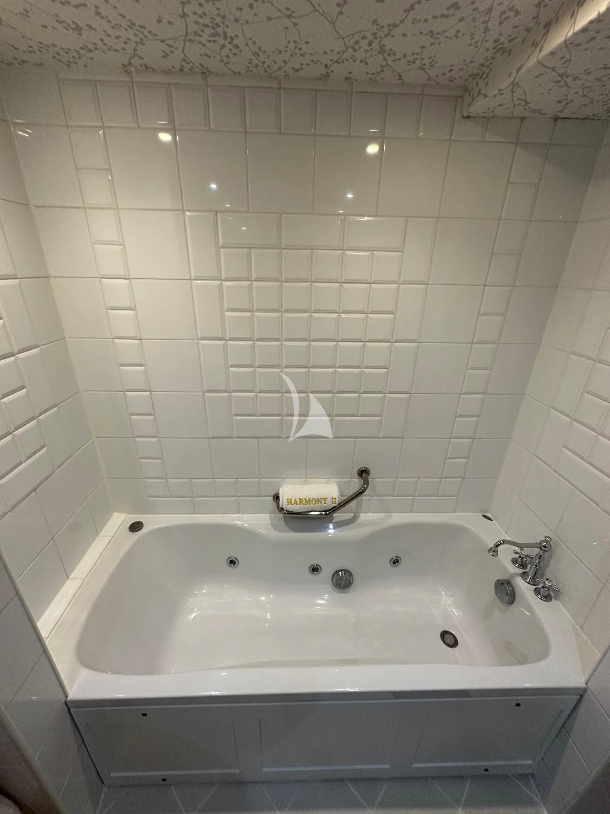 a bathtub with a sink aboard HARMONY II Yacht for Sale
