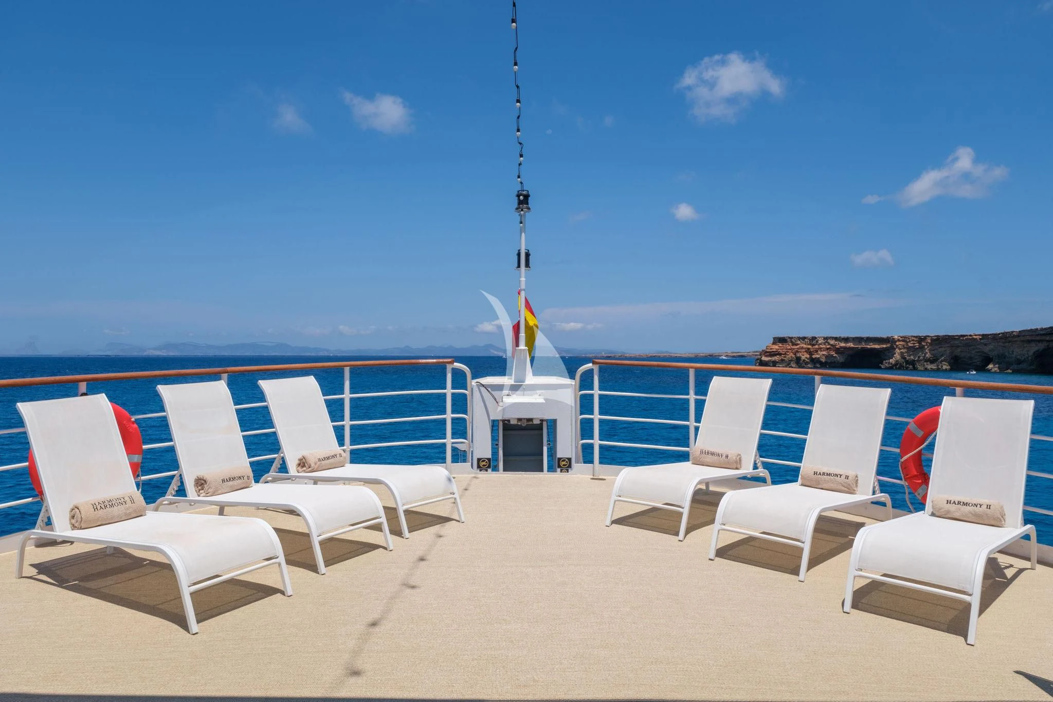 chairs on a deck aboard HARMONY II Yacht for Sale