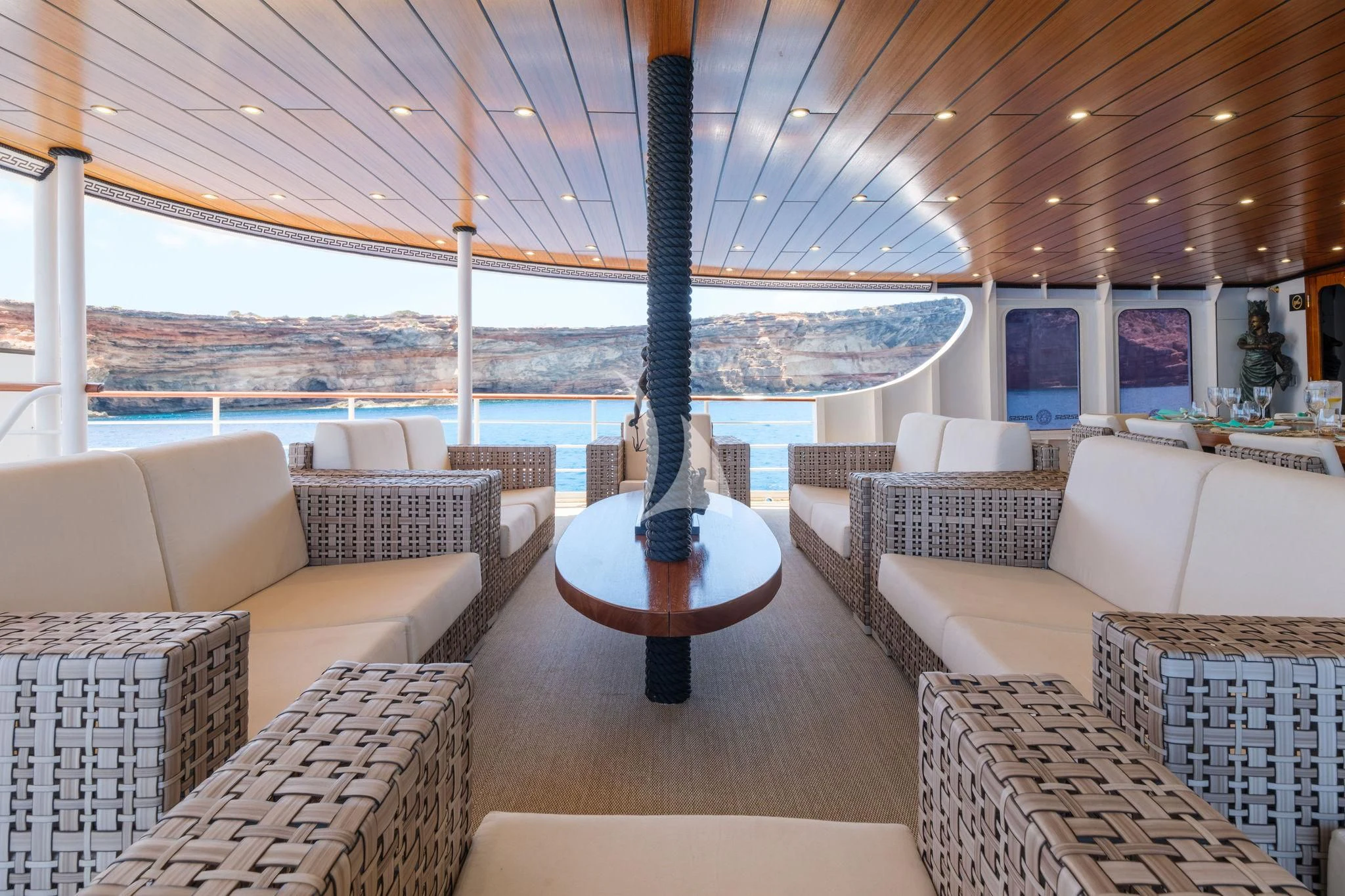 a living room with a large window aboard HARMONY II Yacht for Sale