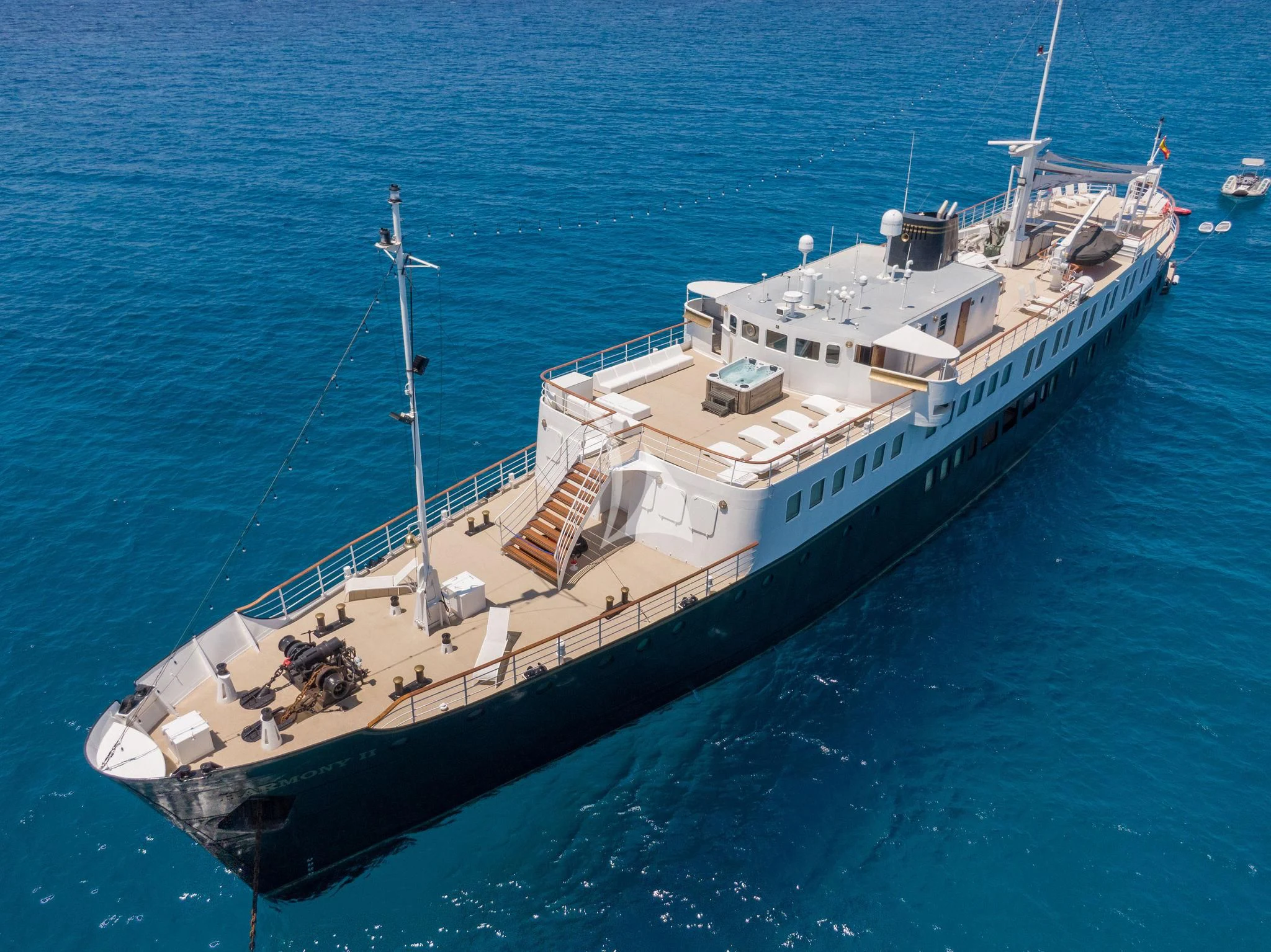a large ship in the water aboard HARMONY II Yacht for Sale