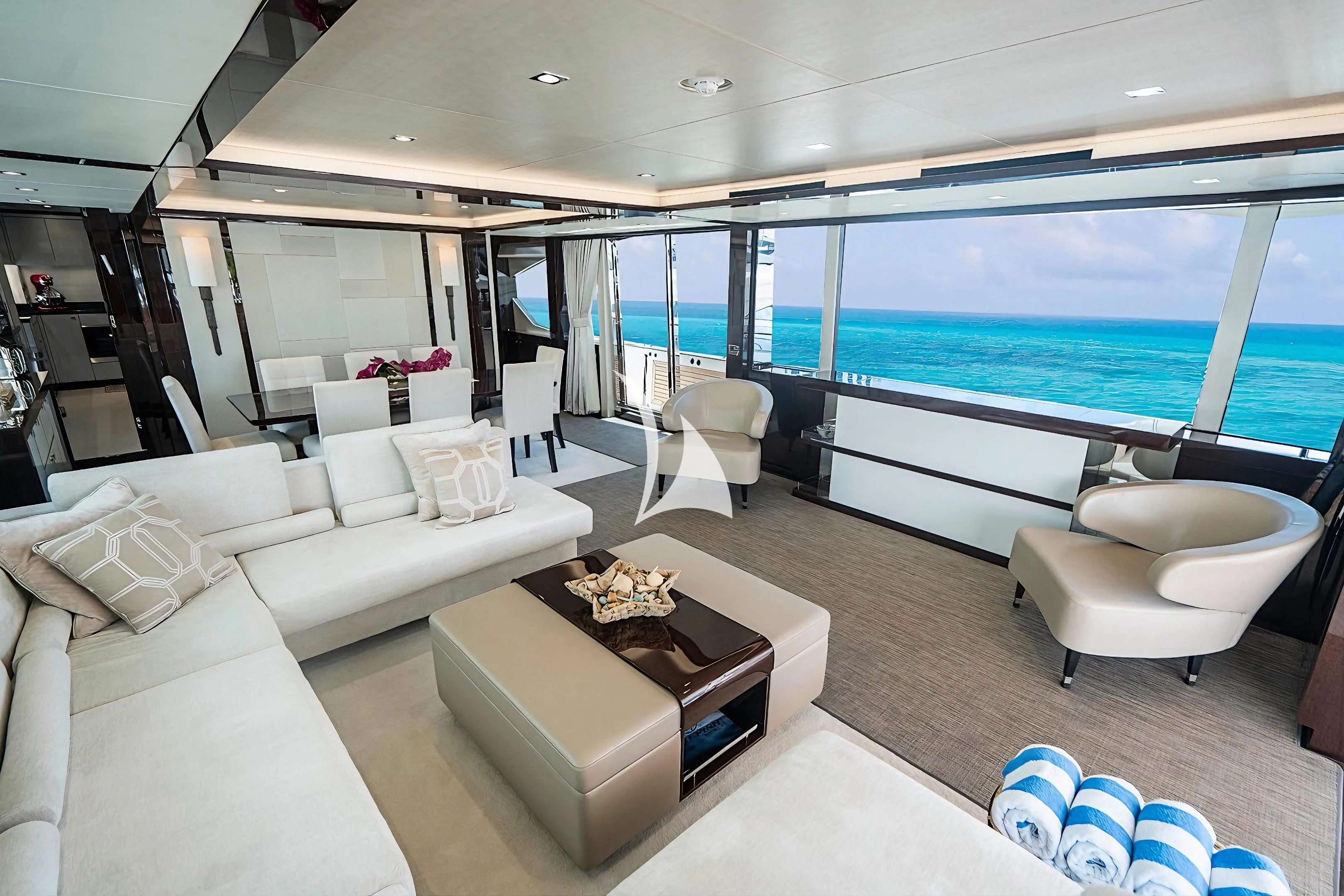 a living room with a large window aboard QUANTUM Yacht for Sale