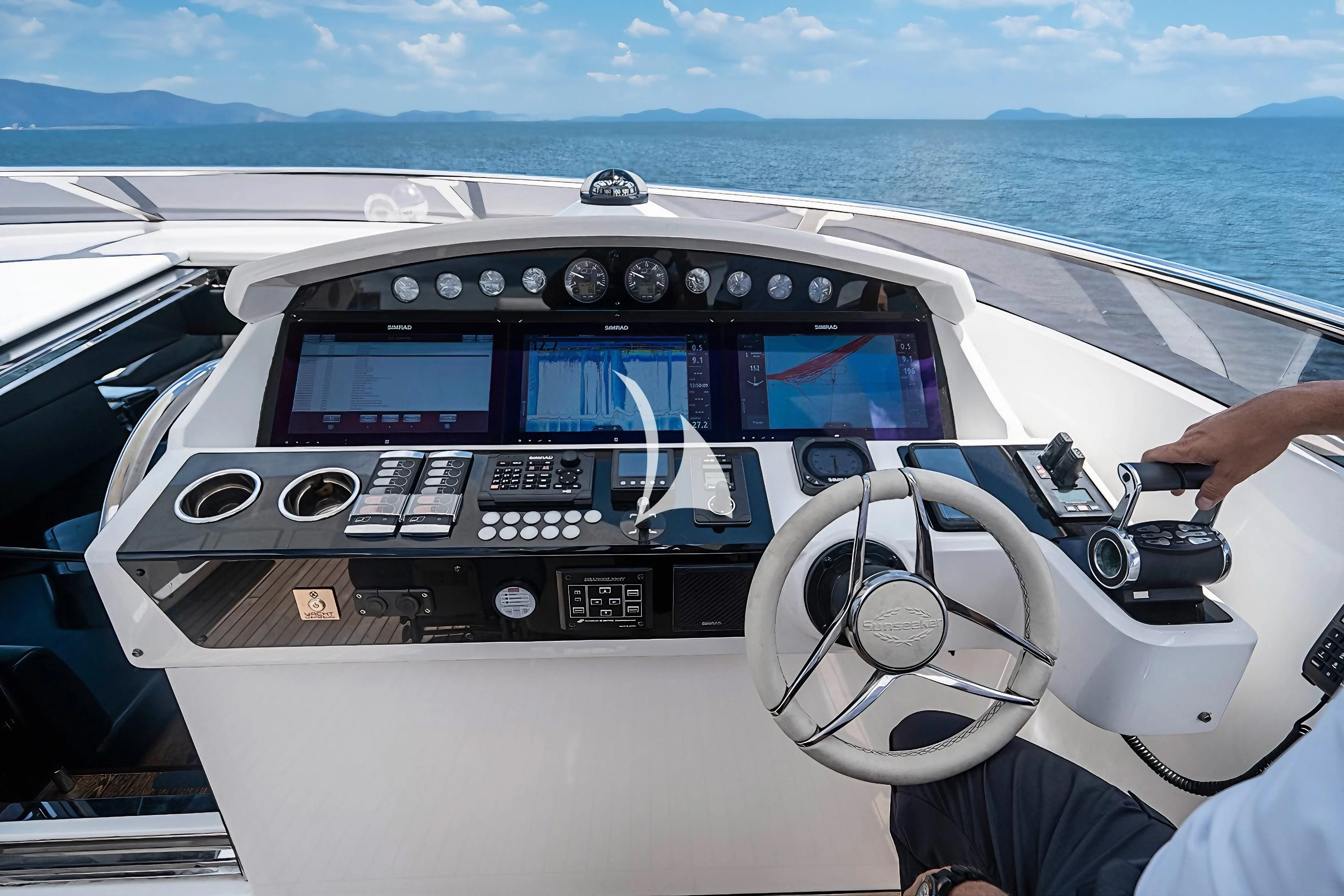 a person driving a car on a road aboard QUANTUM Yacht for Sale