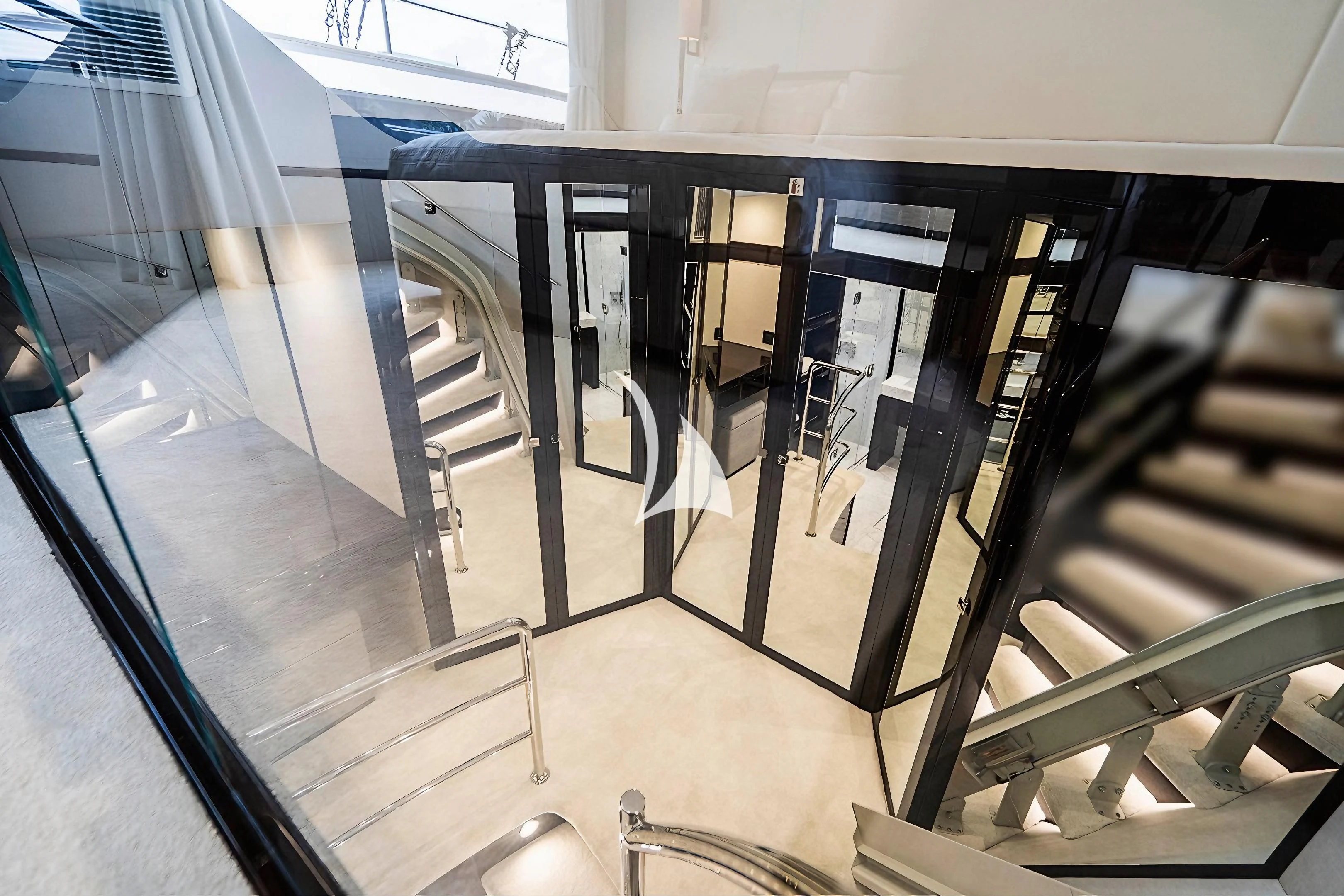 a hallway with glass doors aboard QUANTUM Yacht for Sale