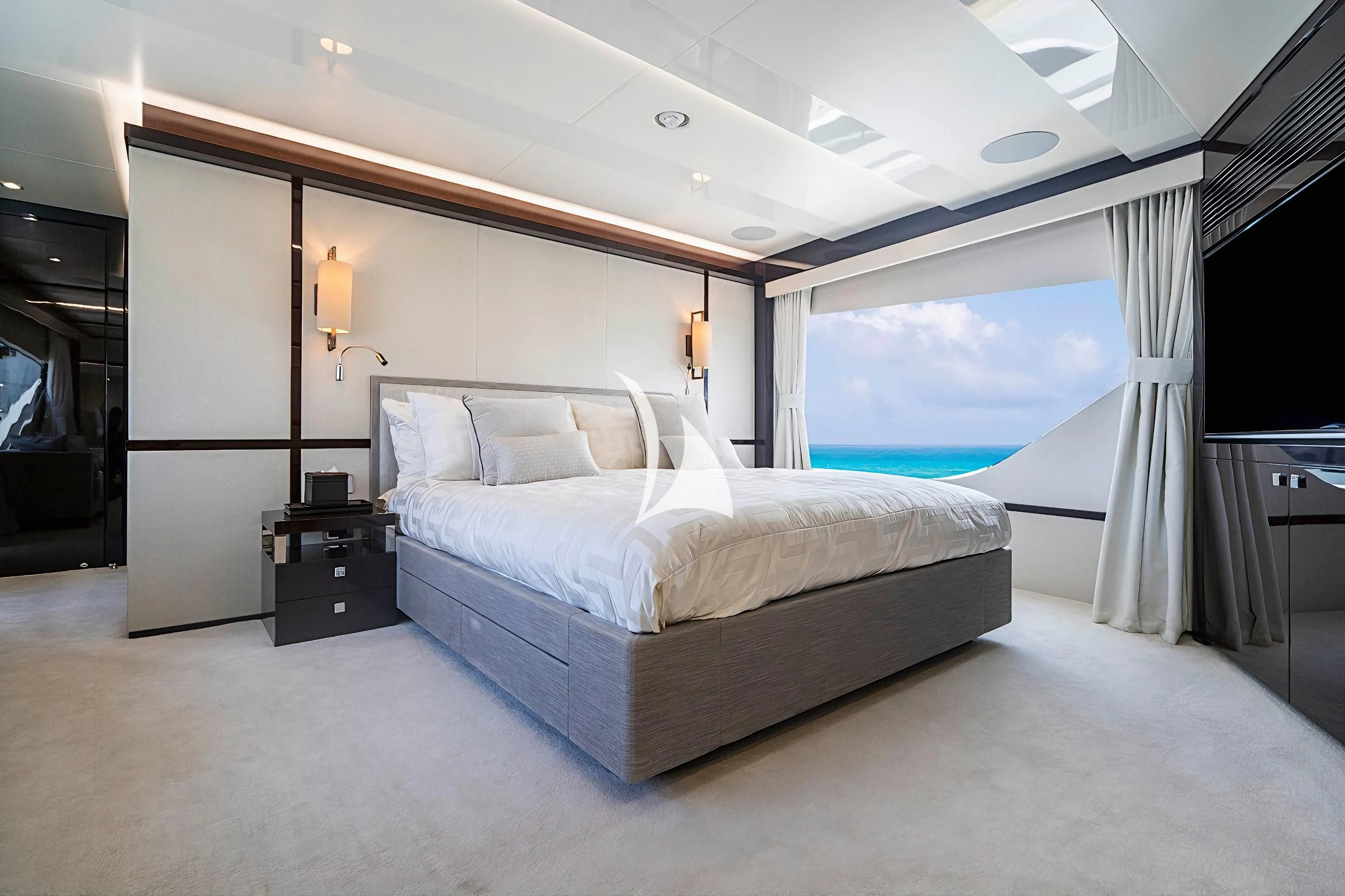 a large bedroom with a large bed aboard QUANTUM Yacht for Sale