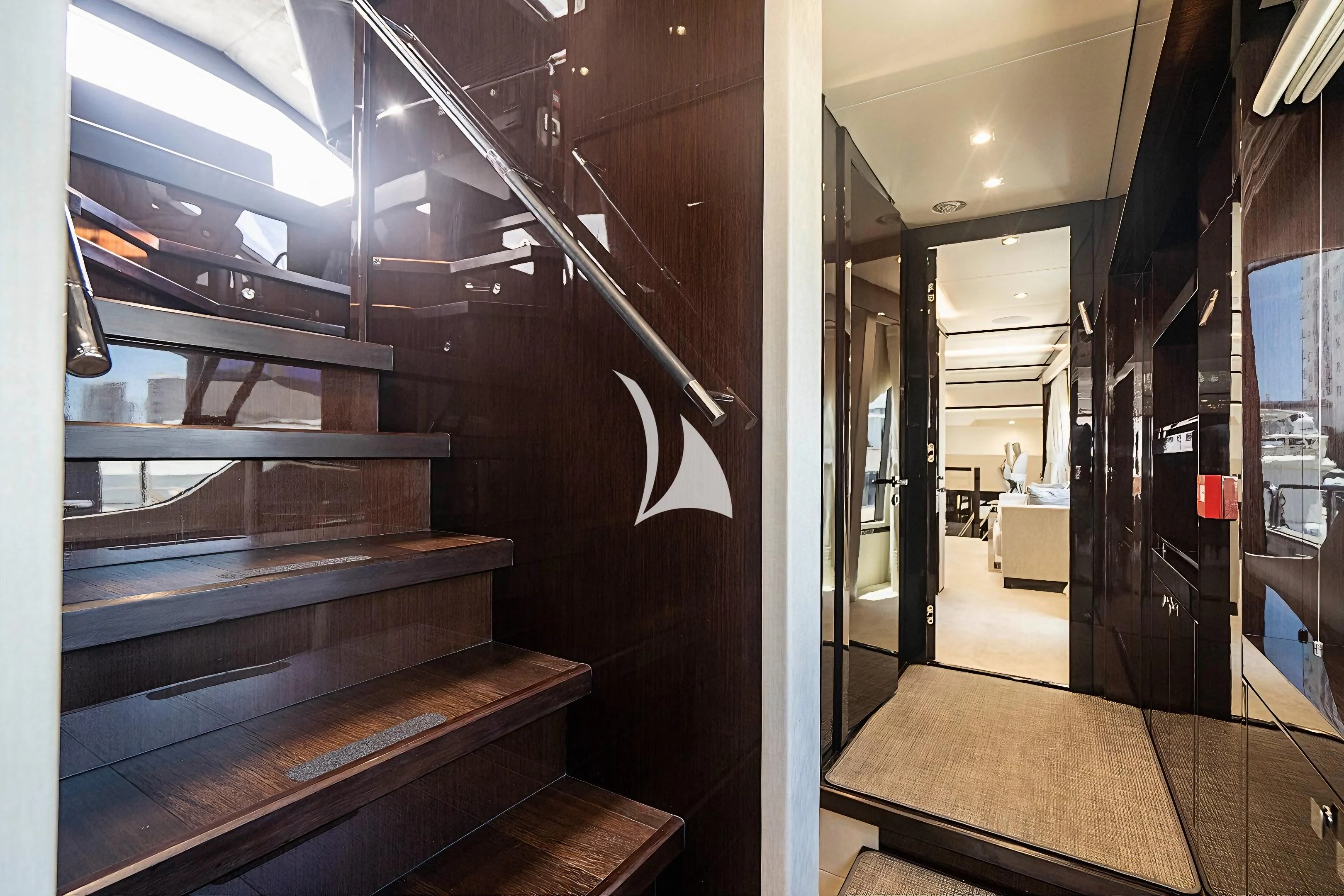 a hallway with wood floors aboard QUANTUM Yacht for Sale