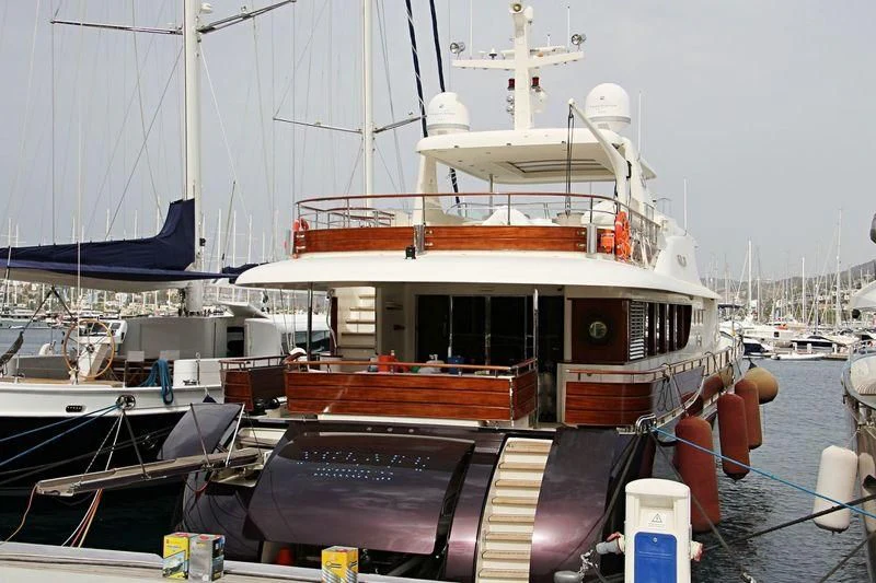 a boat docked at a pier aboard VOLARE Yacht for Sale