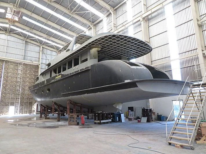 a large metal structure in a building aboard VOLARE Yacht for Sale