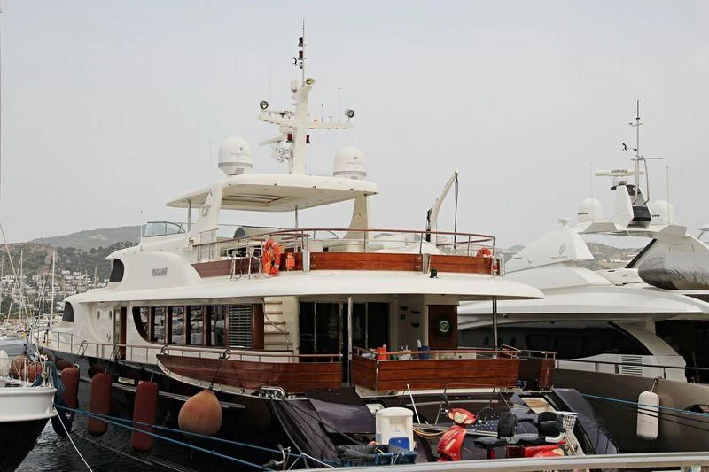 a boat docked at a pier aboard VOLARE Yacht for Sale