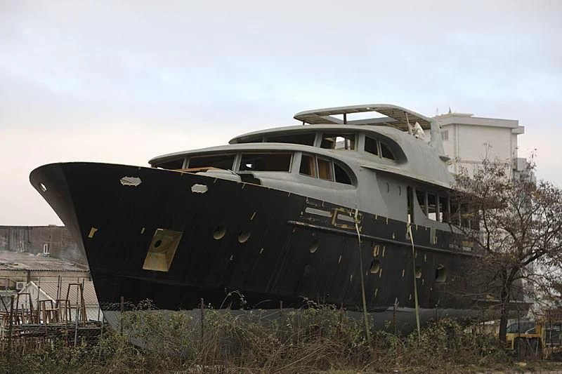 a large military vehicle aboard VOLARE Yacht for Sale