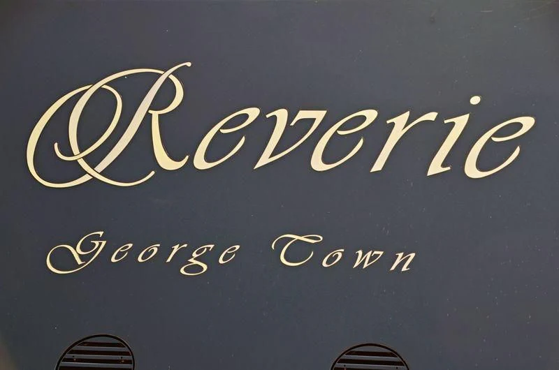 a blue sign with white writing aboard FREEDOM Yacht for Sale