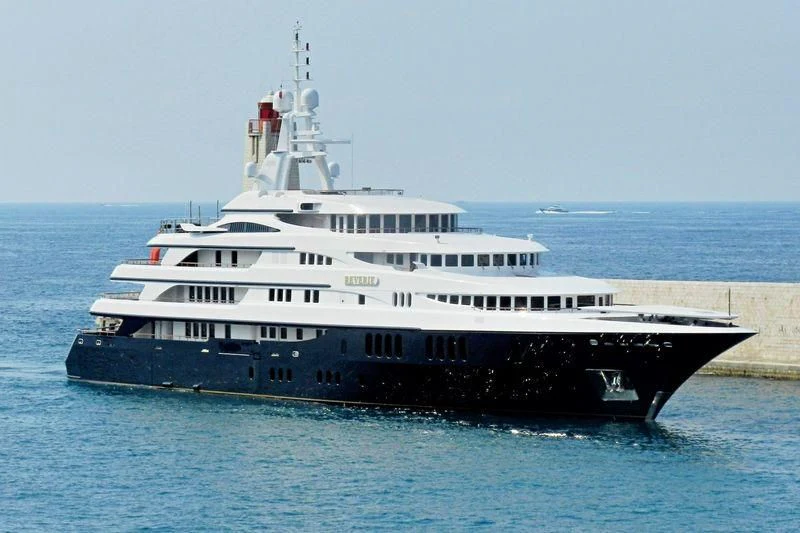 a large boat in the water aboard FREEDOM Yacht for Sale