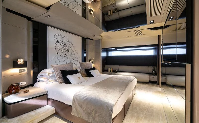 a room with a bed and a tv aboard SAFFURIYA Yacht for Sale