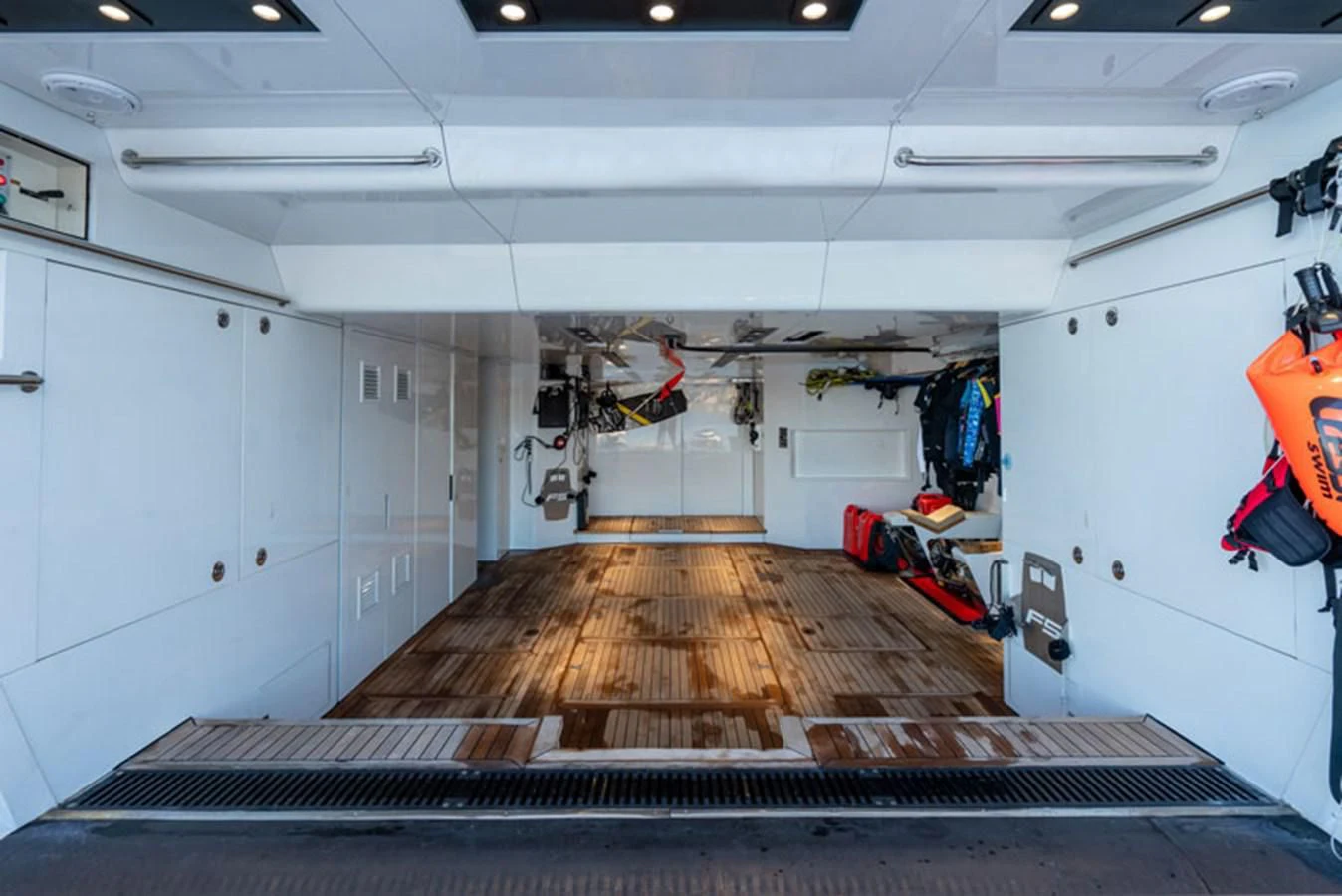 a long hallway with white walls aboard SAFFURIYA Yacht for Sale