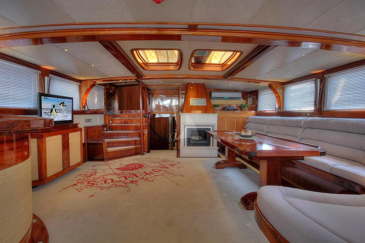 a room with a table and chairs aboard NAUTILUS Yacht for Sale