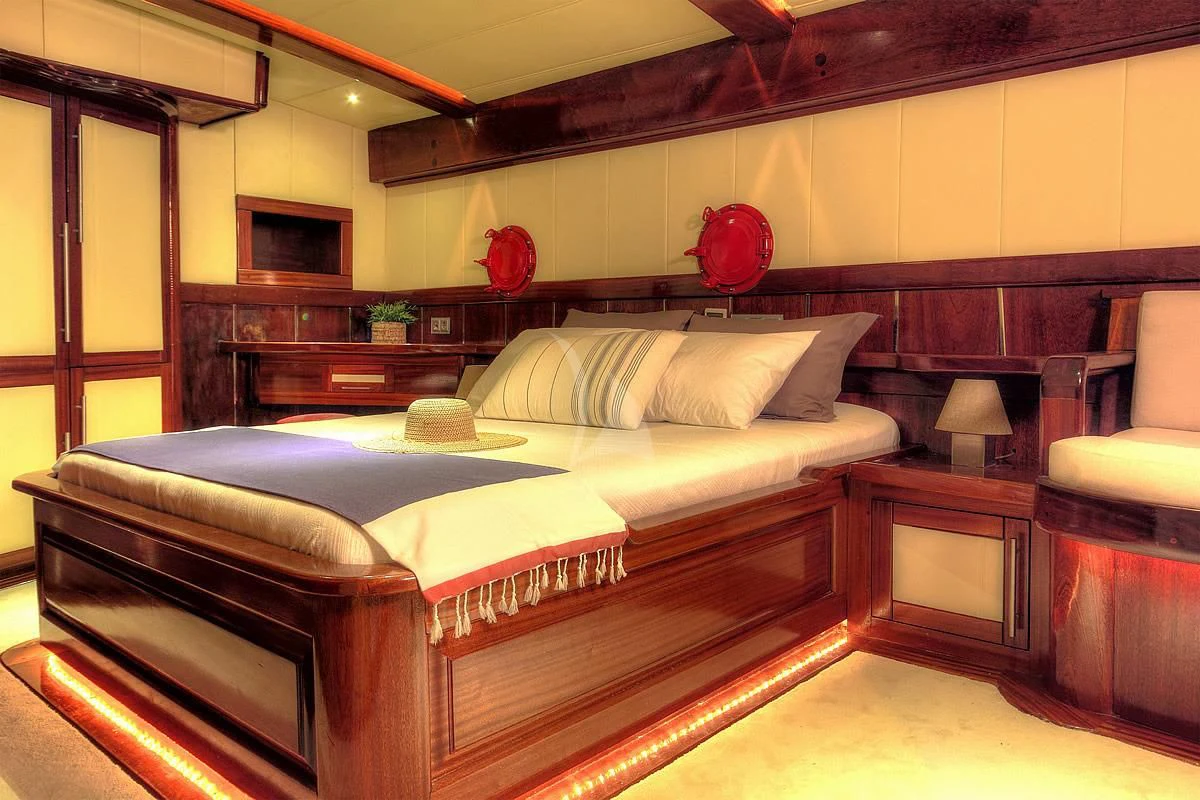 a bed in a room aboard NAUTILUS Yacht for Sale