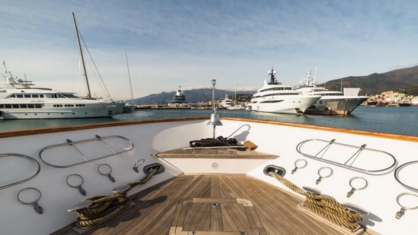 a boat on a dock aboard TRITON Yacht for Sale