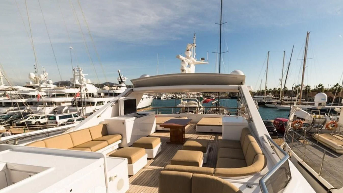 a boat dock with boats aboard TRITON Yacht for Sale