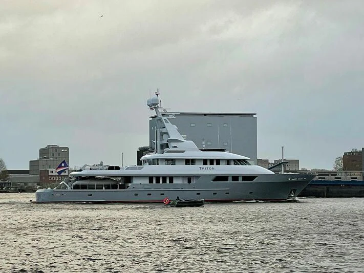a large white boat in the water aboard TRITON Yacht for Sale