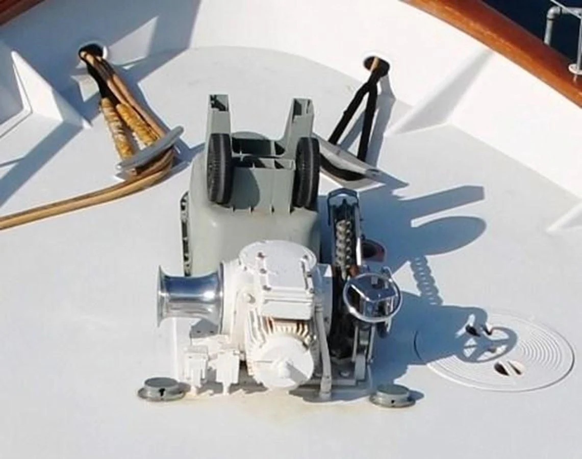 a robot on a white surface aboard ENCHANTRESS Yacht for Sale