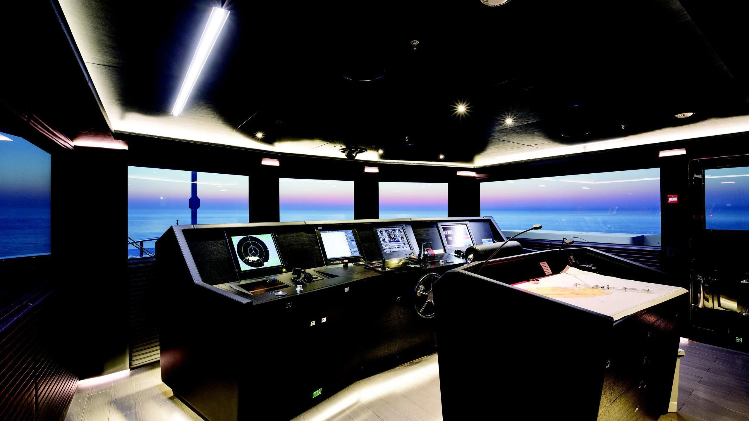 a room with many computers aboard OCEAN PARADISE Yacht for Sale